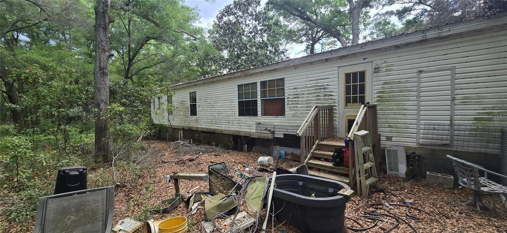 Photo of 1329 NW 18th Way, Bell, FL 32619 (MLS # A4689259)