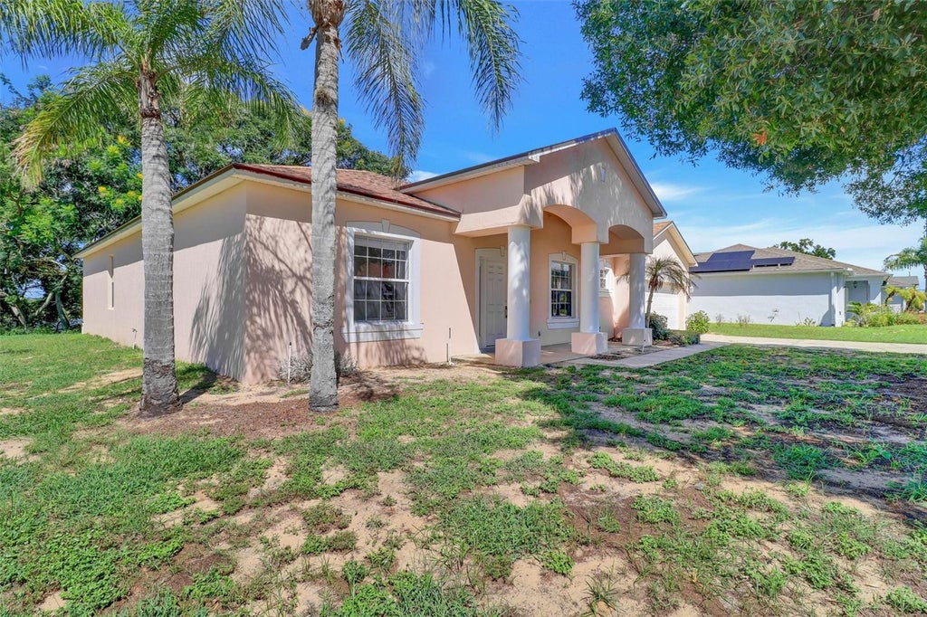 Photo of 215 Pamona Street, Haines City, FL 33844 (MLS # O6438871)