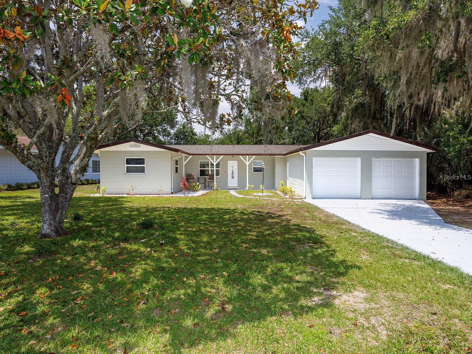Lakeshore Drive is one of Clermont’s most sought out and distinguished locations; offering a tranquil view to Lake Minnehaha which connects to the Chain-of-Lakes. So sit out in front and enjoy the sights of the morning horizon, beautiful sunset or the approaching rain. This 3 bedroom, 2 full bath, 1 Bonus Room with 2 car garage home sits on an acre, providing enough room inside and out. Take your time cooking in your brand-new kitchen while you glance out to the lake, absorbing your peaceful soundings. Home has new laminate throughout, freshly painted and upgraded bathrooms. Enjoy your DIY projects in the additional space located outside the 2-car garage that offers a pass-through the 3rd garage door leading into the backyard. You can take it a step further by simply enjoying the functionality of your spacious back yard or in door porch! If you enjoy water sports well that’s covered to, and if you would like a picnic at the park…that’s only a short 2-minute walk across the way. This home further provides you with your own shed to store more tools, and or recreational gear to simply make life easier. Location is essential in a home after a hard day’s work and with this turn-key opportunity offering no worries there is nothing to think about. There is so much more this unique dwelling provides, but I will let “you” bring your imagination, since this rare home is hard to find! If you're looking for privacy and kind neighbors, this “home” serves it straight to the table, minutes to downtown Clermont, restaurants, bars, shopping and major highways. Lawn included. MORE PICTURES TO FOLLOW!