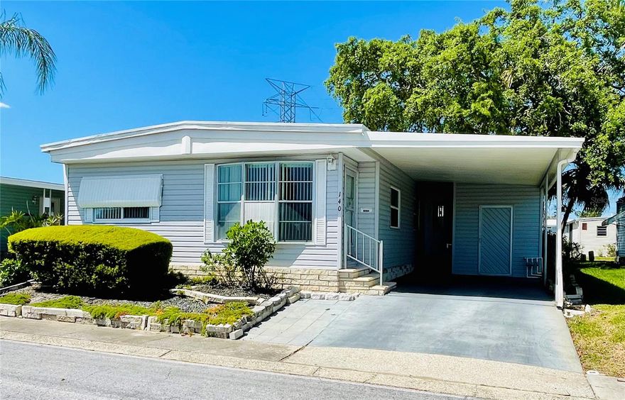 Welcome to easy, carefree Florida living in this well-kept 2-bedroom, 2-bath double-wide manufactured home! Move-in ready and being sold fully furnished—just bring your personal belongings and start enjoying your new home right away. Perfect as either a seasonal getaway or full-time residence. Situated in a desirable non-flood zone on a quiet street within Blue Jay Estates, a vibrant 55+ community where you own your land, this home offers both comfort and convenience. Enjoy low-maintenance living with a modest monthly fee of $230, which covers escrow reserves, water, sewer, trash, lawn care, and more. Residents also have access to a welcoming clubhouse and a wide range of amenities. Inside, the home features an inviting open floor plan that enhances the light-filled space and creates a comfortable flow for everyday living and entertainment. The home is clean and well cared for, with durable vinyl flooring throughout and some newer windows that improve energy efficiency and natural light. There is also plenty of storage space throughout the home. The home includes two bathrooms, one with a tub and the other with a shower for added convenience. The exterior offers room for a cozy seating area along with a one-car driveway, and a shed that houses the washer and dryer. The 120-square-foot rear porch provides additional living space and is equipped with a wall air conditioner and a TV—perfect for relaxing or entertaining year-round. Located in the desirable pet-friendly area of the community, residents are permitted to have one indoor cat or one small dog. Blue Jay Estates also boasts an active social scene with numerous activities, a heated pool for year-round enjoyment, shuffleboard and bocce courts, and even a designated storage area for boats or RVs (subject to availability at no additional cost). Conveniently located near beautiful beaches, the Pinellas Trail, parks, shopping, medical facilities, and airports—this home offers the perfect blend of comfort, community, and convenience.