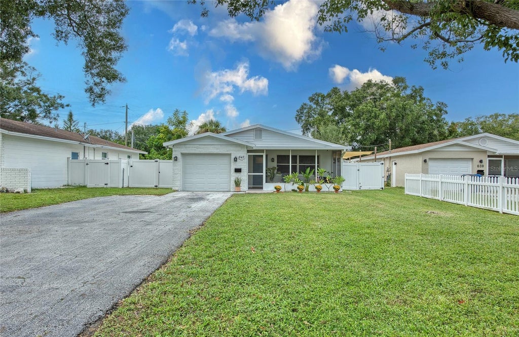 Photo of 643 Southwest Boulevard N, St Petersburg, FL 33703 (MLS # TB8553219)
