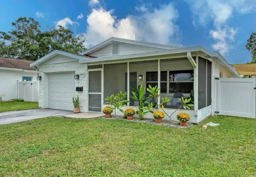 Photo of 643 Southwest Boulevard N, St Petersburg, FL 33703 (MLS # TB8553219)