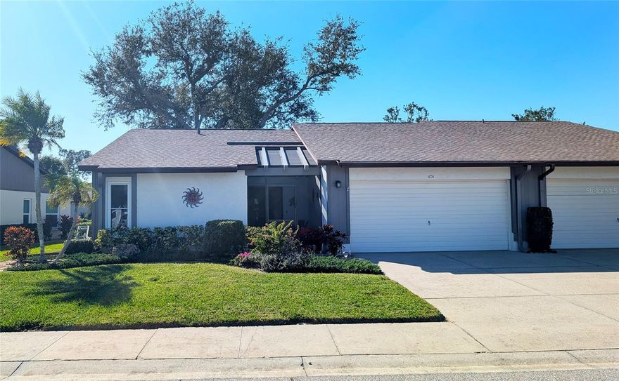 Tastefully Updated 2BR, 2BA ATTACHED VILLA WITH 2 CAR GARAGE. CONVENIENTLY LOCATED ONLY MINUTES TO LOCAL AMENITIES BUT YET TUCKED AWAY IN THE DESIRABLE 55+ NEIGHBORHOOD OF FOXWOOD! The flow of the home is seamless with an open floor plan, living room with vaulted ceilings & nicely appointed tile flooring throughout. The chef in the family will be delighted with an updated kitchen offering ample storage, recessed lights and beautiful countertops. Spacious private master suite provides ample storage options with an oversized walk-in closet. Upgrades include impact windows, new roof in 2023, newer A/C, water heater, and Washer & Dryer. The Foxwood Community is vibrant and offers many activities. The Clubhouse features a heated Pool overlooking the Lake, SPA, Tennis Courts, Bocce Ball, Shuffleboard. LIVE THE FLORIDA LIFE YOU DESERVE! IT’S A MUST SEE!!! CALL TODAY!