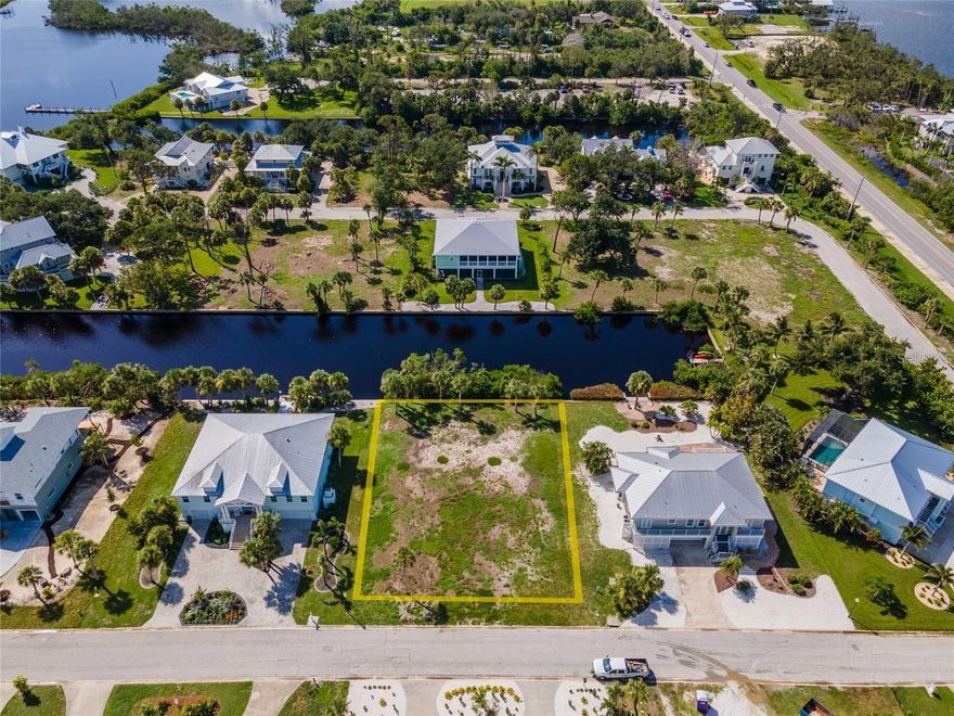 You can buy just the land OR the Builder is available to build a turnkey coastal-style home on this canal-front Placida Harbour Club lot, with multiple design options available—ideal for buyers who want a simple land + build path in a private waterfront community near Boca Grande. Inquire about various options. Large, flat, turnkey builder ready lot.  Public boat launch and marina.  Right at the entrance to Boca Grande and the gorgeous beach at Gasparilla State Park.

• Lot size: ~0.34 acres (about 14,810 sq ft).
• Waterfront: Canal-front lot
• Water access: Listed as having water access to Gulf/Ocean (via the community’s waterways/marina 
• Community/HOA: In Placida Harbour Club / Placida Pointe HOA 
• Amenities called out: Private ferry access to Little Gasparilla Island, multiple pools, hot tub, tennis/pickleball, clubhouses, fitness center,   sauna, library, and marina/boat slips
• Lot characteristics: Cleared/level, oversized, dead-end street, NW-facing orientation.
• Proximity highlights: Minutes to Coral Creek Private Airport, Coral Creek Golf Club, and Boca Grande beaches/dining/shopping. 
• Schools: Vineland Elementary, L.A. Ainger Middle, Lemon Bay High.