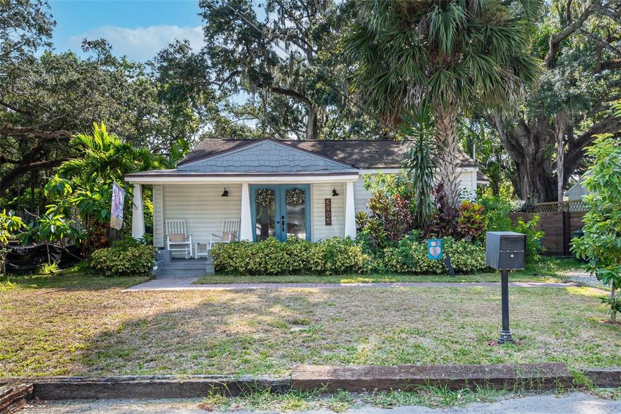Welcome to charming Old Seminole Heights, one of Tampa’s most sought-after historic neighborhoods! This 3-bedroom, 2-bathroom bungalow perfectly blends classic character with modern updates. Step onto the inviting front porch and enter through French doors that open into the living room, creating a warm and welcoming first impression. The home features a well-appointed kitchen with stainless steel appliances and granite countertops, ideal for everyday living and entertaining. The primary bedroom includes a private en-suite bathroom with a stand-up shower, offering comfort and convenience. Major mechanical updates provide peace of mind, including central A/C and a tankless water heater both less than two years old. Outside, you'll find a large backyard shaded by mature oak trees, creating a beautiful space to relax, garden, or entertain. Additional features include an irrigation system, storage shed, and a long driveway perfect for parking a small boat or multiple vehicles. Located just three blocks from Henry & Ola Park, residents can enjoy a variety of outdoor amenities including a dog park, basketball courts, soccer and softball fields, a playground, picnic areas, walking trails, and a community center with organized activities. Enjoy being minutes from the trendy restaurants, breweries, and shops that make Old Seminole Heights one of Tampa’s hottest neighborhoods.