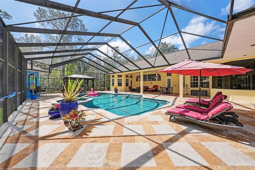 Photo of 10823 Alico Pass, New Port Richey, FL 34655 (MLS # TB8483850)