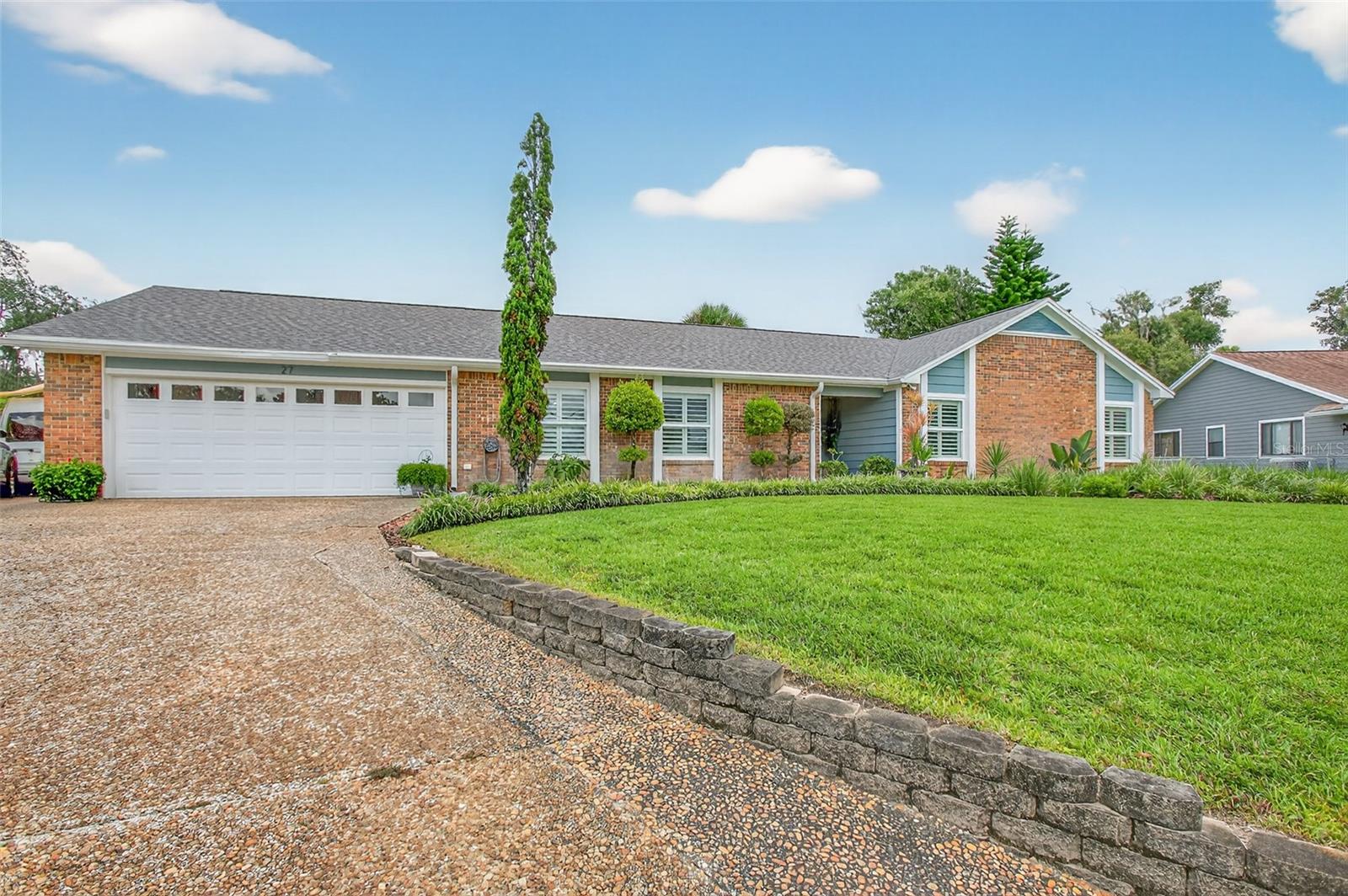 This one is done move in ready for new owners! This 5 Bedroom 3 and 1/2 Bathroom home has been updated with Beautiful Tile and Plantation Shutter thru out. The floor plan offers a Formal Dining room, a Formal Living room and a Family room with Fireplace. Primary Bedroom features a New Bathroom with Lux Shower, Vanity, and walk-in closet. A second suite with built in storage a half bath and a private entrance. Two full baths and three additional bedrooms off foyer. The back of the home has a large airconditioned, all weather room. The garage features built in storage closet to keep things organized. Property has paver walks and a good size paver patio and a paver Fire Pit Patio area. Fenced Yard with a great view of green area (use to be a golf course) New Roof 2024 If you are looking for a home with personal space for everyone, this one is a must see.