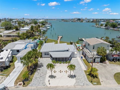 Photo of 708 Sunset Cove, Madeira Beach, FL 33708 (MLS # TB8510951)
