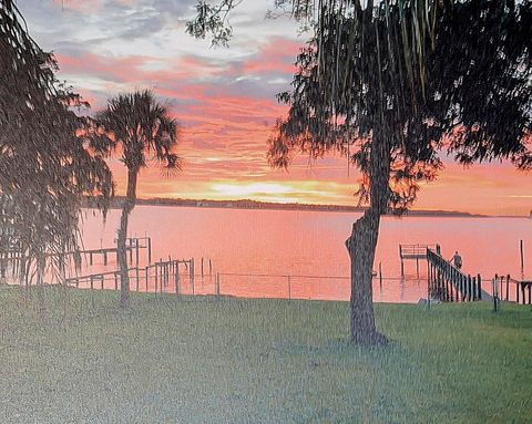 Photo of 115 Sunset Point Road, East Palatka, FL 32131 (MLS # FC312404)