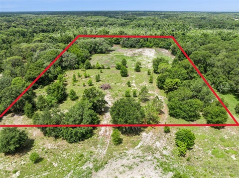 Photo of 2040 Holly Hammock Road, De Leon Springs, FL 32130 (MLS # V4950205)