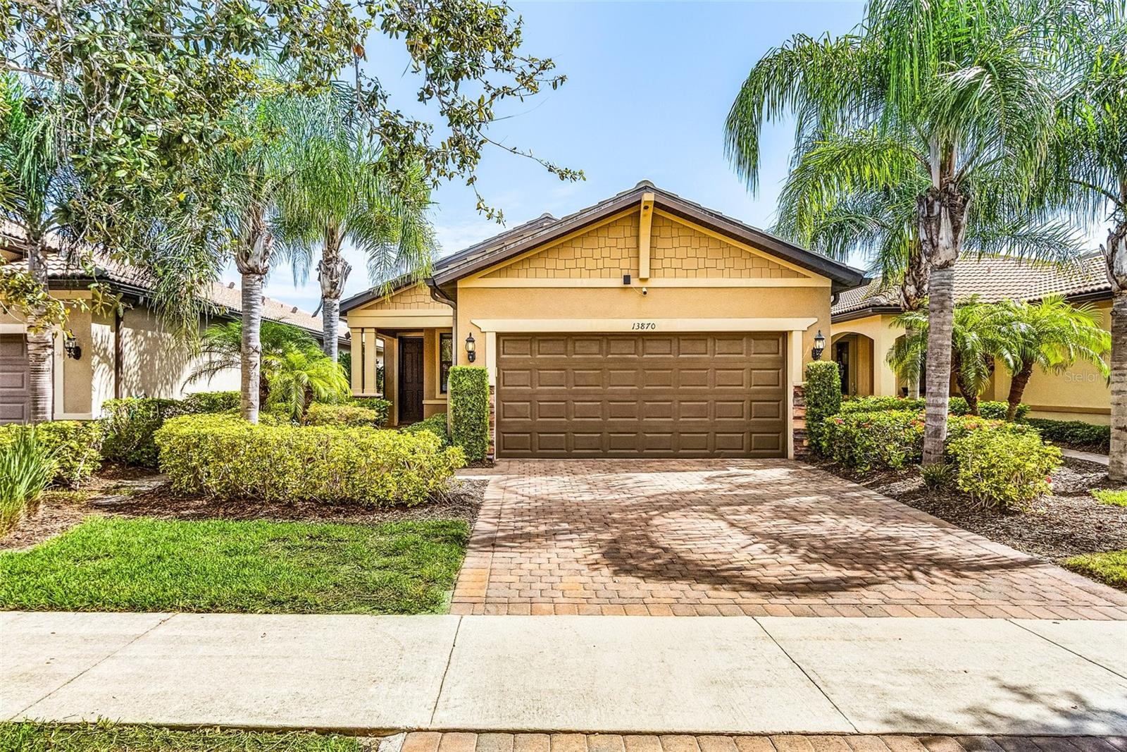 Welcome to this beautifully situated TAFT model home, nestled along the water and ready for its next owner. Combining affordability with a prime location, this 2-bedroom residence also features a flexible bonus room—perfect for use as a home office, creative studio, or cozy den. Step inside and immediately embrace the relaxed Florida lifestyle. The kitchen is both stylish and functional, boasting ample cabinetry, a generously sized island, granite countertops, pendant lighting, stainless steel appliances, a custom tile backsplash, and a walk-in pantry.
The thoughtful split floor plan ensures privacy, with the guest bedroom and bath on one end of the home, while the primary suite is tucked away on the other. The owner's retreat includes a spacious walk-in closet, dual sinks, and a large walk-in shower. Out back, the extended lanai showcases tranquil water views and an inviting in-ground pool—ideal for unwinding or entertaining. Added durability and safety come with hurricane-impact windows and doors.
Residents of IslandWalk enjoy a low-maintenance lifestyle, with HOA fees covering lawn care, cable, WiFi, access to amenities, and round-the-clock security. This active Venice community features a wealth of amenities including two resort-style pools, a lap pool, 12 pickleball courts, 8 Har-Tru tennis courts, a dog park, basketball court, playground, community garden, and more. A full-time activities director organizes events, clubs, and social gatherings throughout the year. Two clubhouses and an event center serve as the community’s hub, surrounded by miles of scenic trails, golf cart paths, Venetian-style bridges, and peaceful waterways.
Nearby attractions include the Atlanta Braves Spring Training stadium and the new marketplace with Publix, restaurants, and shops just a short ride away. Wellen Park’s downtown district adds even more appeal with its 80-acre lake, waterfront dining, boutique shopping, rooftop lounges, splash pad, playground, and public town hall hosting live performances. Future additions like a hammock grove and dedicated food truck park are also on the way. Homes with pools in this area are rare—don’t miss your chance to see what makes this one so special!
