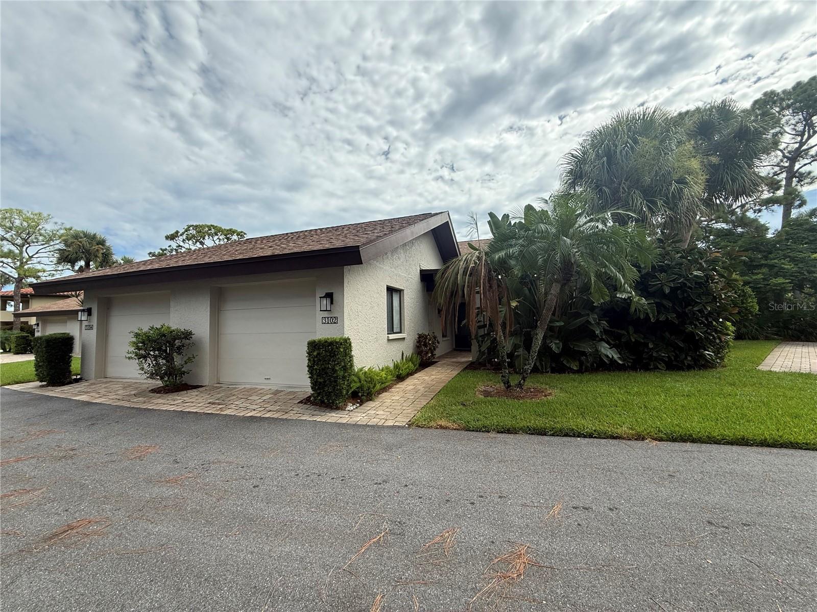 Available for short-term rental (3-month minimum). This beautiful end-unit villa in The Meadows offers the perfect home away from home; ideal if you’re building, remodeling, relocating, or simply looking for a Florida getaway. Bright and welcoming, the villa features cathedral ceilings, tall windows, and walls of sliders that fill the space with natural light while showcasing tranquil pond views and lush landscaping. The kitchen is designed for both style and convenience with off-white soft-close cabinetry, stunning Baltic granite countertops, and easy access to the grilling patio. The primary suite offers a peaceful retreat with pond views, crown molding, a walk-in closet, dual vanities, and a glass-enclosed shower. With no adjacent neighbors, enjoy true privacy and serenity. Step outside to a heated community pool just a block away, or explore all The Meadows has to offer: 14 miles of biking and hiking trails, tennis courts, pickleball, dining close by; all set on 1,650 acres of park-like grounds with 80 lakes. The location is unbeatable; just 15 minutes to downtown Sarasota, St. Armands Circle, Lido Beach, and close to UTC Mall, Nathan Benderson Park, Whole Foods, Trader Joe’s, the new Mote SEA Aquarium, and more. Utilities, cable, and Wi-Fi are included, plus a one-car garage for your convenience. Whether you’re here for work, transition, or relaxation, this villa is the perfect spot to enjoy the Sarasota lifestyle.