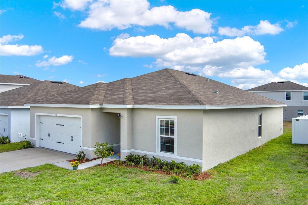 Photo of 1511 Finnigan Circle, Haines City, FL 33844 (MLS # O6438940)
