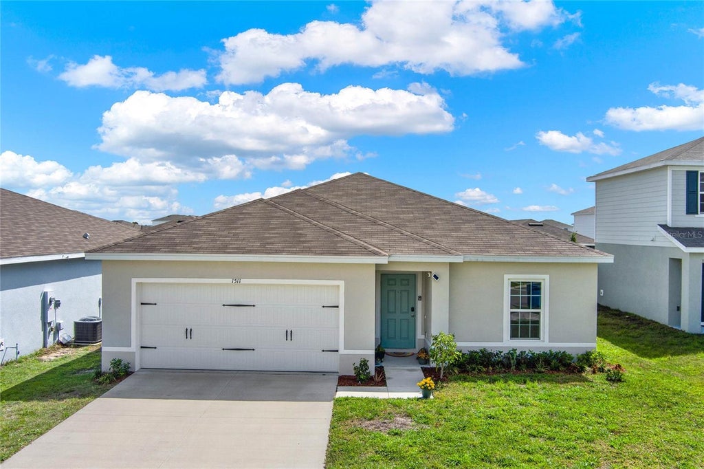 Photo of 1511 Finnigan Circle, Haines City, FL 33844 (MLS # O6438940)