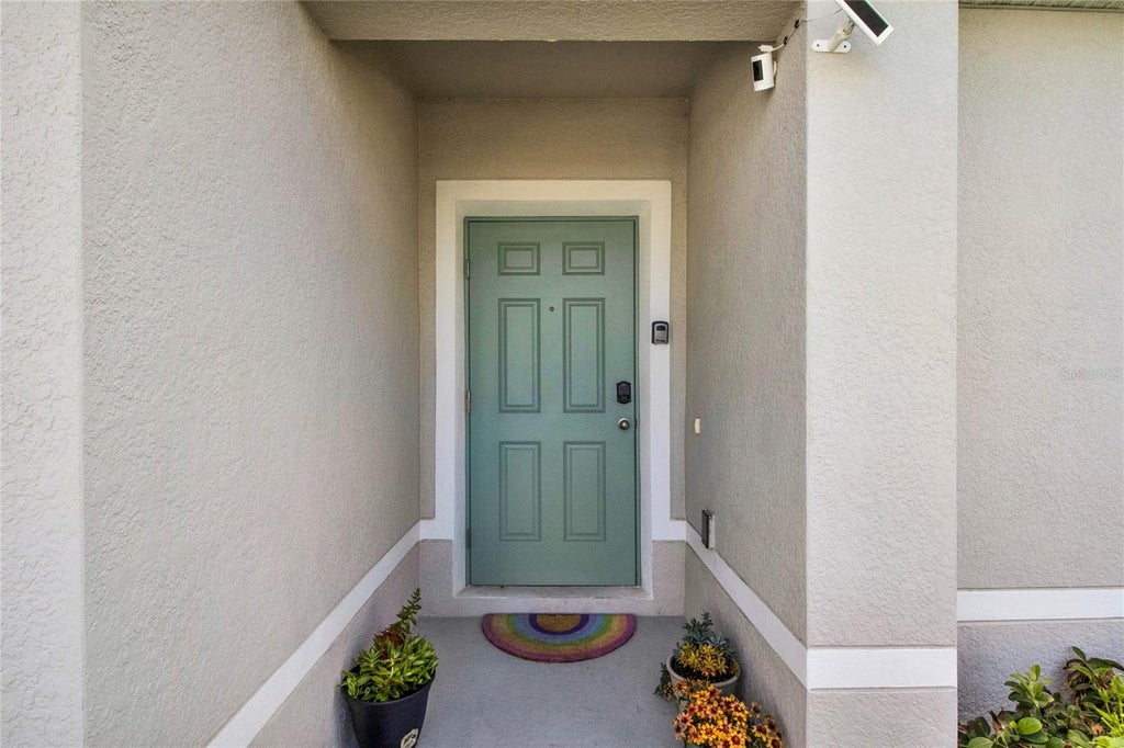 Photo of 1511 Finnigan Circle, Haines City, FL 33844 (MLS # O6438940)