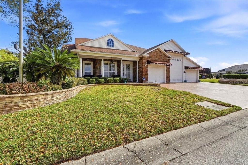 Photo of 305 Motorcoach Drive S, Polk City, FL 33868 (MLS # L4960001)