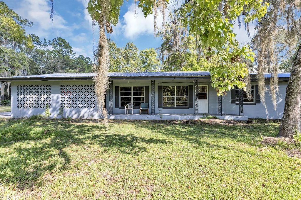 Photo of 140 Buffalo Bluff Road, Palatka, FL 32177 (MLS # O6354344)