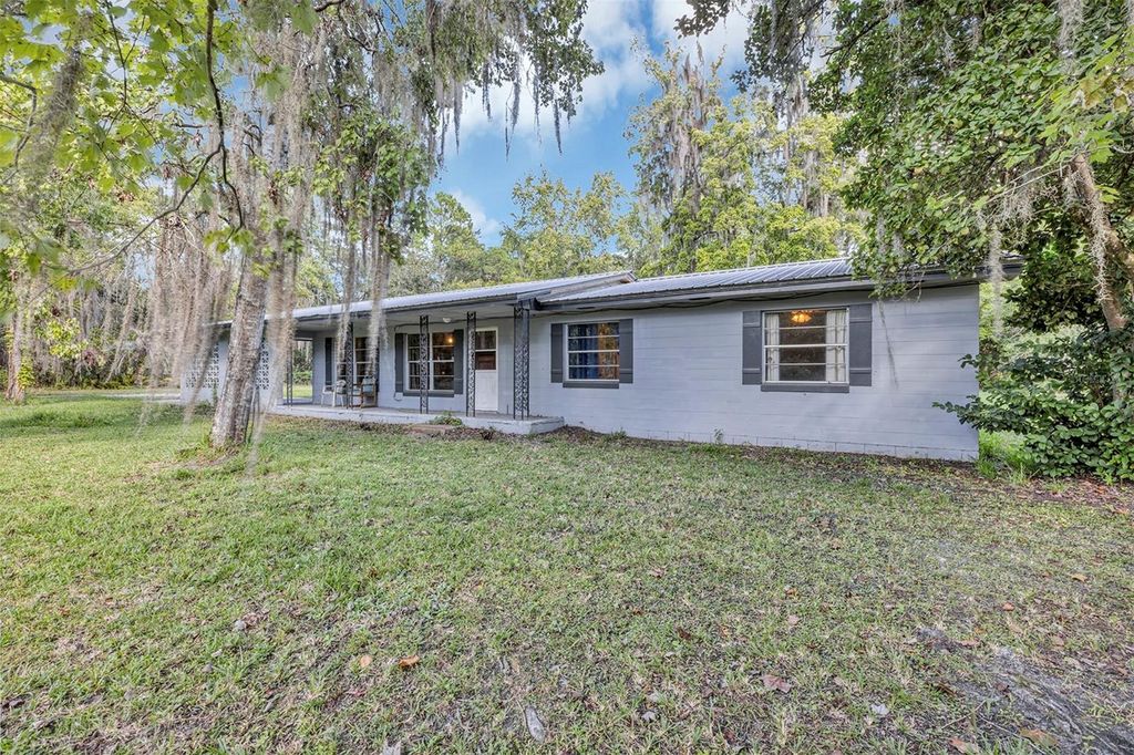 Photo of 140 Buffalo Bluff Road, Palatka, FL 32177 (MLS # O6354344)