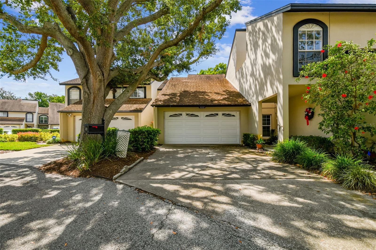 Unlock the Potential in Carrollwood Village! This 2-bedroom, 2.5-bathroom condo offers a rare opportunity to create your dream home in Fairway Lakes Townhomes. Perfectly positioned with serene pond views and just moments from the Carrollwood Country Club & Golf Course, this home combines a tranquil setting with an unbeatable location. One of only eight in the community, the spacious floor plan is brimming with potential—ready for your personal touch and updates. Imagine transforming the living area into a bright, open-concept retreat that takes full advantage of the beautiful views. The screened patio and balcony is the ideal spot to unwind and take in the serene surroundings. A living room, family room, dining room, kitchen, and half bath complete the first floor. Two bedrooms and two full bathrooms are privately tucked away on the second floor including a generously-sized primary bedroom with walk-in closet and large ensuite bathroom. Located in a well-established community and steps from the community pool, with easy access to shopping, dining, and major roadways, this condo is perfect for investors, snowbirds, or anyone looking for a project in a premier neighborhood. Water, sewer, trash, and basic cable and internet package, and more are all included in the monthly condo fees. Bring your vision and make this Carrollwood Village gem your own. Schedule your private showing today!
