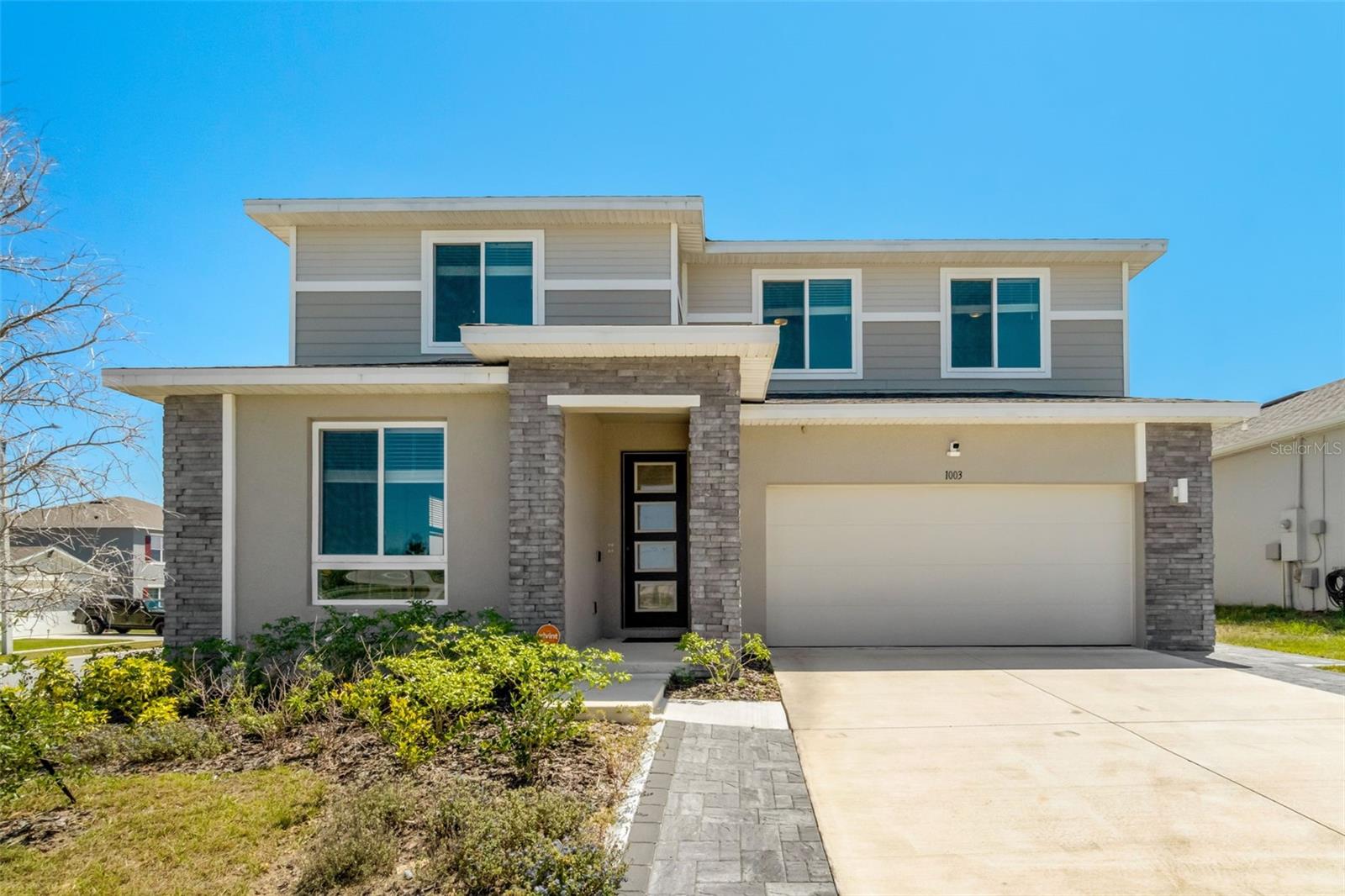 Step into modern comfort and thoughtful design in this expansive 5-bedroom, 3.5-bath home with a private in-law suite—perfect for extended
family or guests. Built in 2023, this two-story layout offers luxury vinyl plank flooring, a chef-inspired kitchen with quartz countertops and
stainless steel appliances, and a flexible upstairs loft ideal for a second living space or office. Located in Forest Lake, a master-planned
community with a resort-style pool, playground, and scenic walking trails. Conveniently positioned near I-4 and US-27, this home offers the ideal
blend of serenity and accessibility—just minutes from dining, shopping, and Central Florida’s world-class attractions.