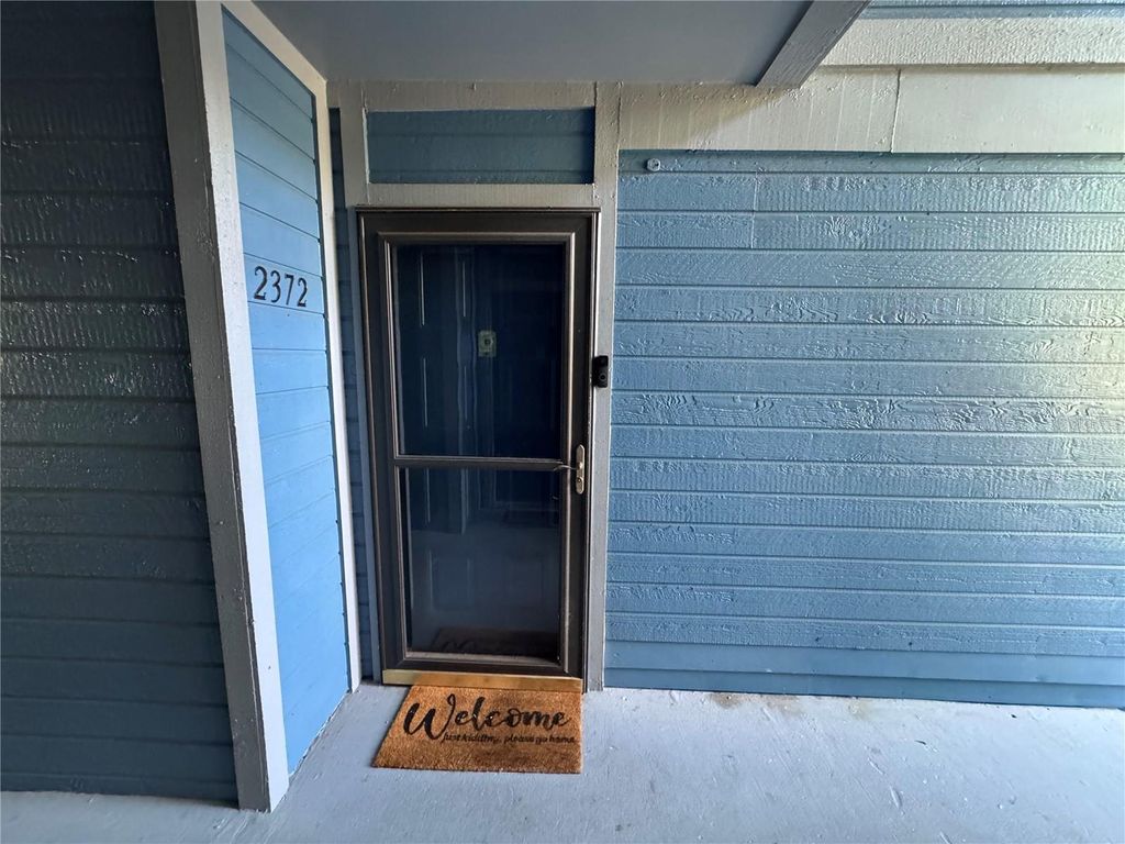 Photo of 2372 Oak Park Way #104, Orlando, FL 32822 (MLS # O6408681)