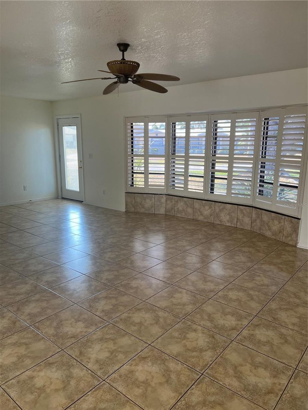 Photo of 355 Spring Lake Boulevard NW, Port Charlotte, FL 33952 (MLS # C7521369)