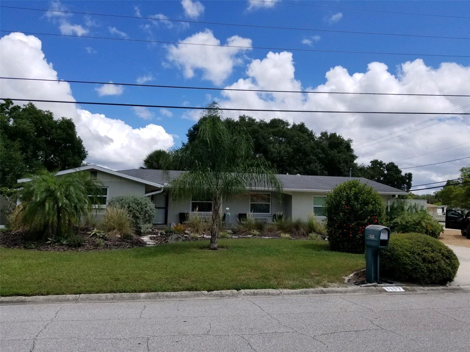 RENOVATIONS CURRENTLY GOING ON IN THE MAIN HOUSE. Main house plus In-Law Suite. Spacious 5 bedroom/4 Bathroom unfurnished annual rental in desirable South Gate neighborhood. Close to everything Sarasota has to enjoy. Updated modern kitchen and baths. The principle residence has 3 bedrooms and 2 baths. Tile and commercial vinyl plank floors. Primary bedroom has a spacious walk-in closet. Also, a large indoor laundry room in the primary residence. Enjoy the small heated pool in the enclosed lanai and the fenced in back yard. The in-law residence includes a 2 bedroom, 2 bathroom self-contained. In-Law suit with vinyl plank and tile floors throughout. The in-law primary bedroom has a spacious closet, with additionl, stormy weather closet adjacent to the second laundry area, providing additional space for all your storage needs. All bedrooms are very nicely sized. A lovely private garden ouside the in-law primary bedroom to enjoy your morining coffee. Or sit out on your back patio and listen to the trickle of Bermuda Brook. Designated parking shade cloth off each driveway. Dogs permitted (up to 2 with breed restictions in place). Utilities not included. Membership to the South Gate Commnity Center available.