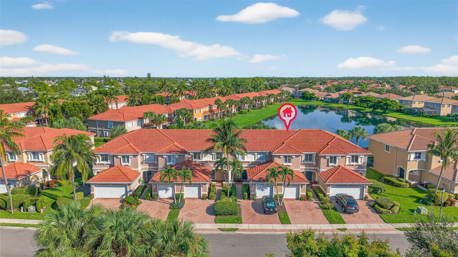 Discover the perfect blend of comfort and convenience in this beautiful lakefront Townhouse located in the sought-after Bella Vida Gated community. This spacious 3-bedroom +den, 2.5-bath home with an attached garage has been lovingly maintained and offers plenty of room to unwind. The open first floor features a generous living and dining area, an eat-in kitchen, a convenient laundry room, and a guest half-bath. Step outside to your screened lanai and enjoy breathtaking views of the serene lake right in your backyard. Upstairs, you’ll find three well-sized bedrooms plus a versatile loft—ideal for a home office, playroom, or media space. Just a short walk away are the community’s resort-style amenities, including a clubhouse, fitness center, billiards, pool, tennis courts, playground, baseball field, and volleyball. With low HOA fees and an abundance of living space, this home is truly a rare find!