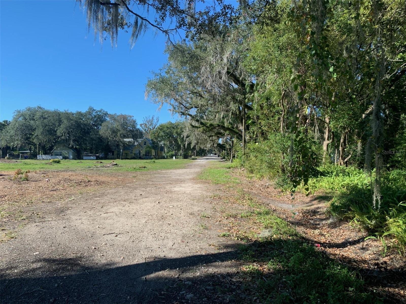 Two lots combined, approximately .82 of an acre (Tax ID 28-25-29-1681-0001-0010 and 28-25-29-1681-0001-0020) in Downtown Kissimmee. Ideal location for the development. The City envisions 3 Story Height buildings with Commercial or Residential Zoning. It is T40 zoning which allows up to 20 units to the acre with lakeview, current zoning residential.
Located two blocks to the Osceola County Courthouse, and just one block to the Kissimmee Lakefront Park, Big Toho Marina, and fishing. Do not miss this opportunity! Bring your plans!