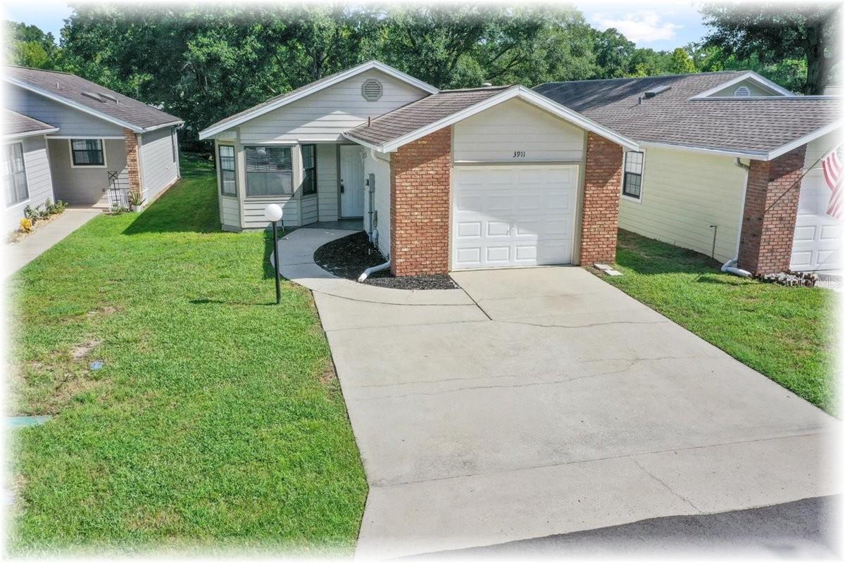 ALL REMODELED SO YOU CAN MOVE RIGHT INTO THIS HOME W OVERSIZED GARAGE - PLUS VERY PRIVATE SETTING – HAS NO BACK DOOR NEIGHBOR – AND IS JUST DOWN FROM COMMUNITY POOL & CLUBHOUSE! THIS 2/2 SPLIT HAS LARGE LIVING RM WITH NEWER WOOD LOOK VINYL LAMINATE FLOORS – HIGH CATH CLGS W ABOVE ACCENT LIGHTING - PLUS HAS A PASS THRU TO BIG KITCHEN W LOTS OF LIGHT CABS, APPLS INC BUILTIN MICROWAVE, RANGE, DISHWASHER & DISPOSAL ALONG W PANTRY – ALL OPEN TO BREAKFAST NOOK W BAY WINDOW – EVEN HAS REAR VINYL ENCLOSED RM W HEAT & AIR SO GREAT FOR FAMILY ACTIVITES – SPACIOUS REAR MASTER BEDRM HAS VAULTED CEILINGS PLUS NEWER FLOORING & WALKIN CLOSET, MASTER BATHRM HAS STEP IN SHOWER – GUEST BEDRM HAS DBL WALL CLOSETS PERFECT FOR STORAGE – GUEST BATHRM HAS TUB/SHOWER COMBO – INSIDE LAUNDRY IS NICE SO YOU DON’T HAVE TO GO INTO GARAGE TO DO LAUNDRY – OVERSIZED GARAGE HAS LAUNDRY TUB & GARAGE DOOR OPENER – VERY PRIVATE BACKYARD IS PERFECT FOR RELAXING – VERY NICE TO NOT HAVE BACK DOOR NEIGHBORS TOO – JUST A COUPLE DOORS DOWN IS THE COMMUNITY POOL & CLUBHOUSE THAT IS GREAT FOR FAMILY FUN EVEN HAS ADDITIONAL PARKING FOR GUESTS – ROOF 2017 - NEW AC SYSTEM IN 2024 - NEWER WATER HEATER TOO - YOU TRULY WILL LOVE THIS HOME – NO WORK NEEDED HERE TO MOVE IN