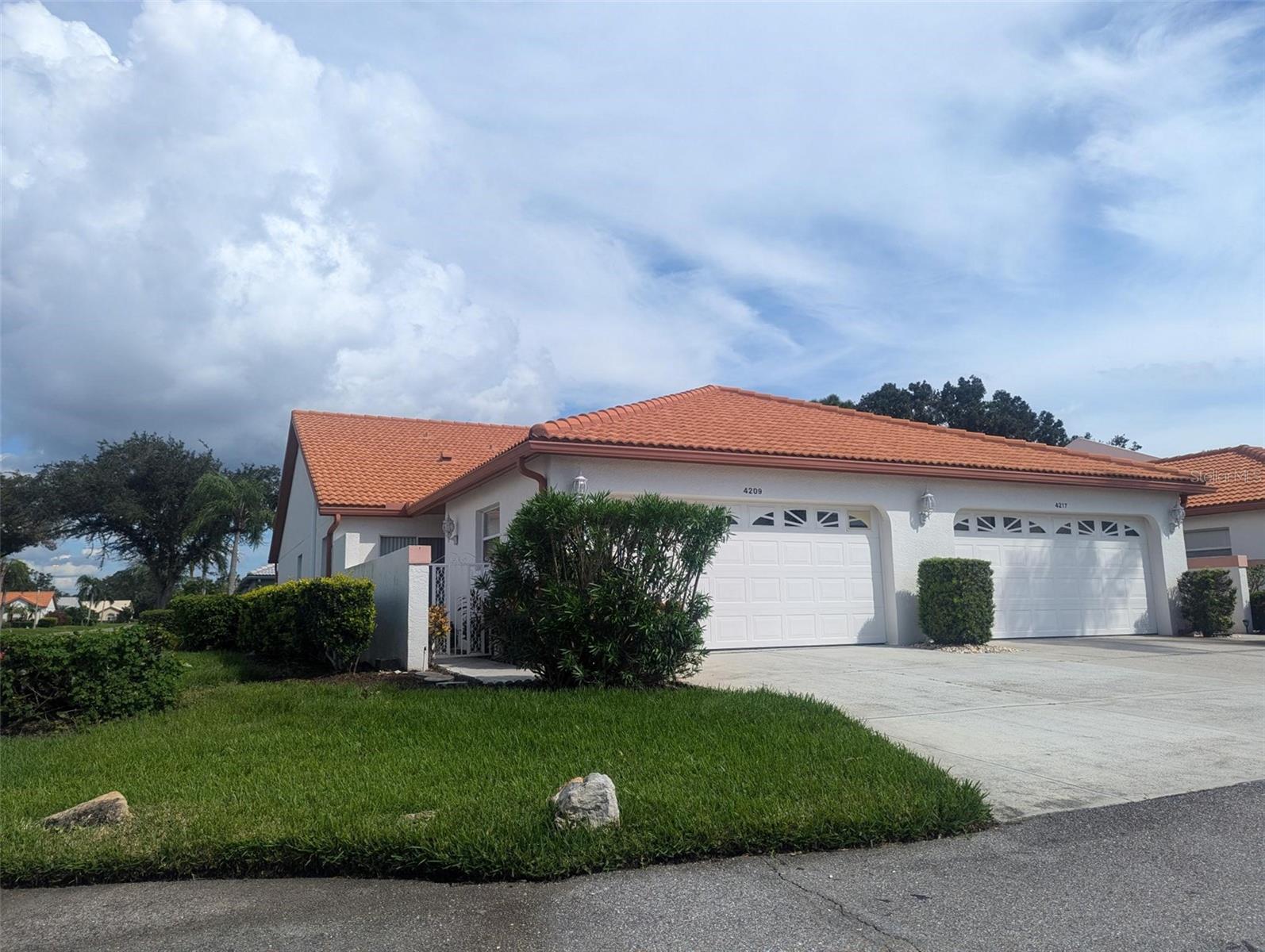 FURNISHED LONG TERM OR SHORT TERM. 3 MONTH MINIMUM. High season rate is $4200 per month. One level 2 bedrooms with a den and a 2 car garage. 2 queen size beds, separate breakfast room. Enclosed lanai, washer and dryer included. Long term or off season will pay electric, water, internet.