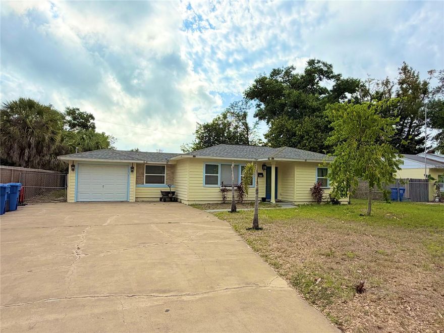 Beautifully updated 3-bedroom, 3-bath home in the desirable Azalea subdivision offering exceptional location and living. NON FLOOD ZONE, NO HOA. Open layout, the fully equipped kitchen features modern finishes with granite countertops, cooking island, stainless steel NEW appliances, & recessed lighting, flowing into spacious living areas with luxury TILE flooring throughout. This split bedroom floorplan offers 2 Primary Bedrooms with walk in closets and en-suite bathrooms. Step outside onto your covered back patio, a considerable amount of space that would be perfect for entertaining, the private backyard is also completely fenced —Home was fully updated in 2021 - ROOF, PLUMBING, AC; 2022 WELL PUMP FOR IRRIGATION added + WATER SOFTENER.   Additional highlights include off-street parking with a large front parking pad, 1 car garage with remote.   Centrally located, easy access to the interstate, shopping, fine dining, beaches, Pinellas Trail, downtown St. Pete and more.  Schedule a showing today, will not last.