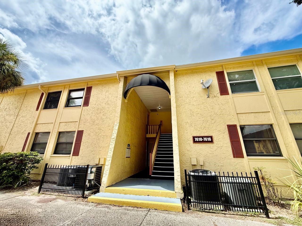 Step into this bright and airy second-floor 3-bedroom, 2-bath condo featuring a welcoming open floor plan and stylish updates throughout in the sought after community of The Greens of Town and Country. Enjoy wood laminate flooring in the main living areas paired with brand new plush carpeting in the bedrooms for added comfort. The kitchen offers an all-white appliance package, abundant cabinetry, and a functional layout perfect for everyday living. Ceiling fans throughout the home add comfort and energy efficiency. The spacious primary bedroom includes a private ensuite bathroom and a generous walk-in closet. A full-size washer and dryer are included for your convenience. Relax and unwind on the large, open balcony complete with a covered area ideal for enjoying the outdoors in any weather. Dont miss this opportunity to make this beautiful condo your new home. Schedule your showing today! In addition to the advertised base rent, all residents are enrolled in the Resident Benefits Package (RBP) for $50.00/month which includes HVAC air filter delivery, credit building to help boost your credit score with timely rent payments, utility concierge service making utility connection a breeze during your move-in, and much more! More details upon application. Lawn care and water are included in rent. Pets welcome, max 2, 25 lbs. Vacant and Available now!