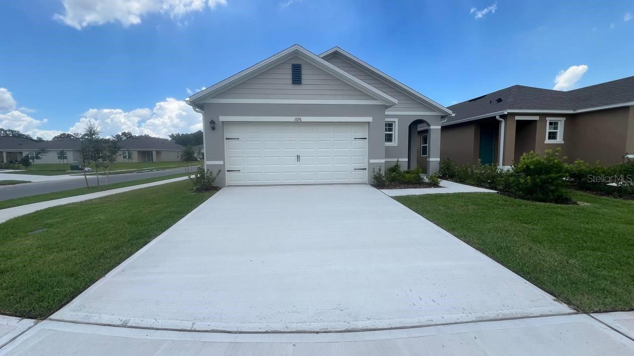 Brand-new single-family home for rent in the desirable Kindred community in Kissimmee, featuring 1,504 sq. ft. of living space with 3 bedrooms, 2 full bathrooms, and a 2-car garage. This never-lived-in home offers an open-concept layout with luxury vinyl plank flooring in main areas, plush carpet in bedrooms, 8’8” ceilings, a modern kitchen with stainless steel appliances (range, microwave, dishwasher) and an island, 2” faux wood blinds throughout, smart home features including video doorbell, smart thermostat and keyless entry, plus an indoor laundry room; washer and dryer will be delivered and installed once the tenant is in place. Enjoy community amenities such as pools, playgrounds, parks, and walking trails, all in a convenient location close to shopping, dining, and major highways.