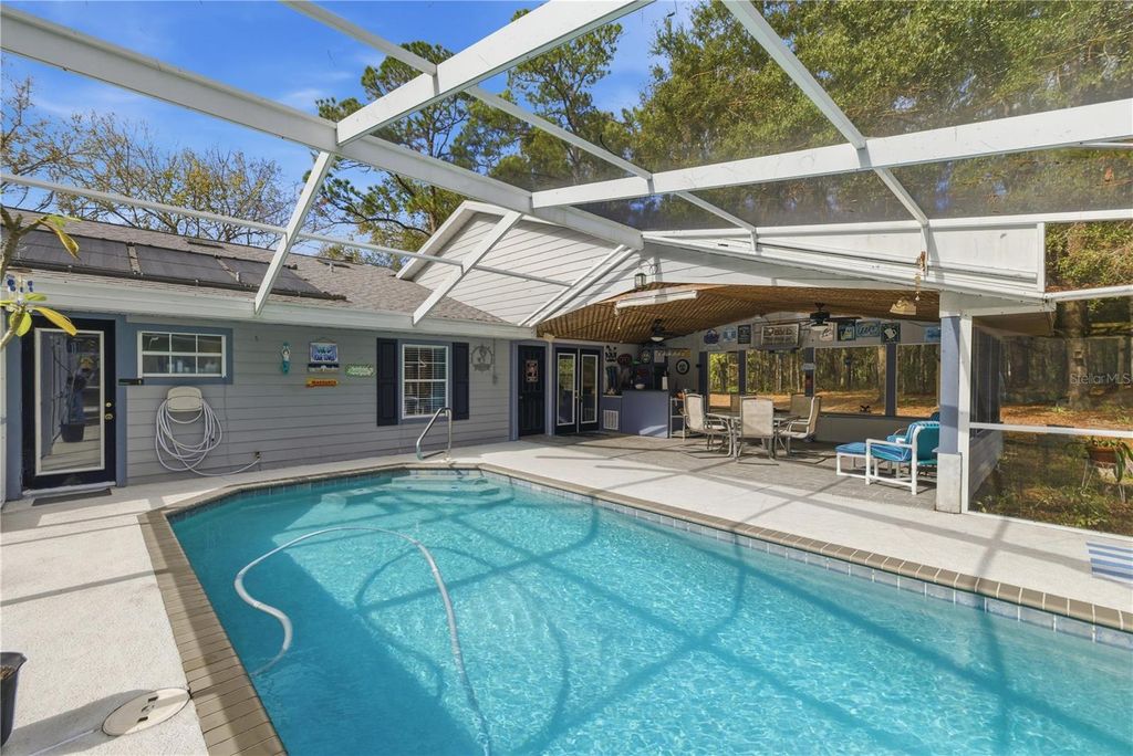 Photo of 7885 SW 202nd Avenue, Dunnellon, FL 34431 (MLS # OM714874)