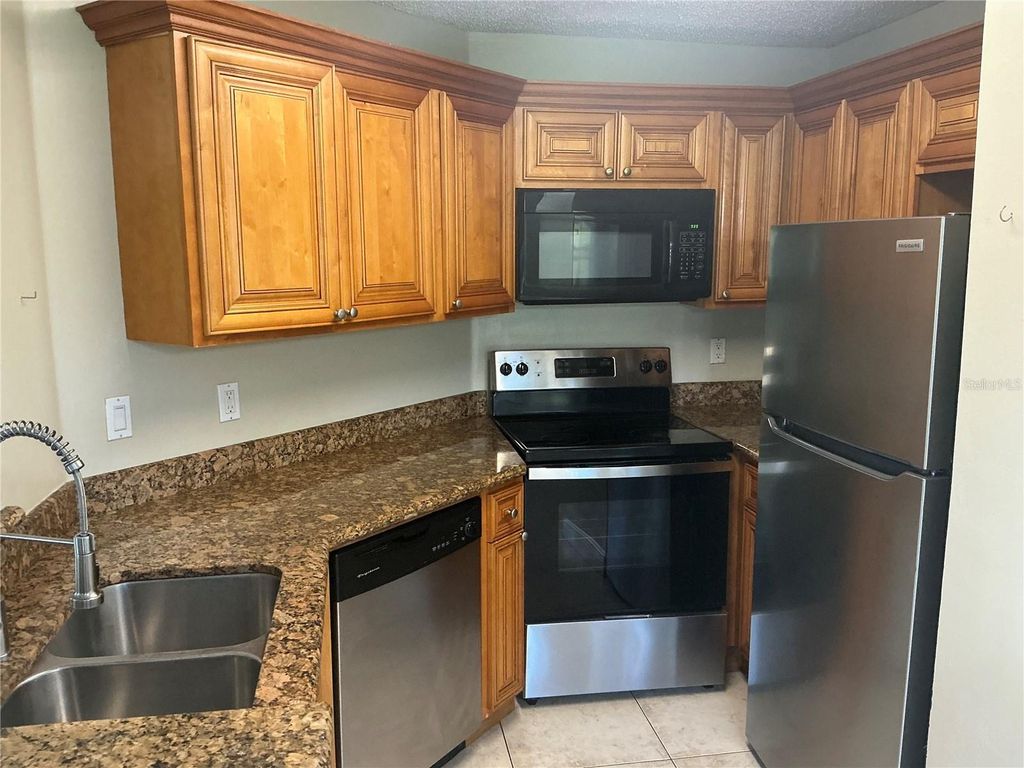 Photo of 715 Sugar Bay Way #107, Lake Mary, FL 32746 (MLS # O6356606)