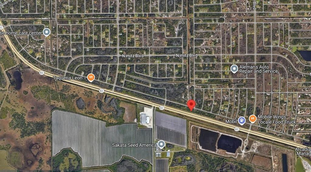 Photo of 2838 Meadow Road, Lehigh Acres, FL 33974 (MLS # C7505835)