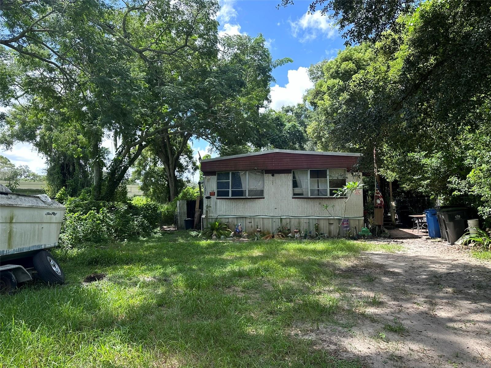 This property, located in Citrus Park in North Tampa, offers the convenience of being adjacent to the Citrus Park Town Center without the burden of HOA or CDD fees. Nearby attractions include Rocky Creek Trails Nature Preserve, Old Memorial Golf Club, and numerous shopping and dining destinations. Additionally, it is just a short drive to Tampa International Airport, USF hospitals and campus, and downtown Tampa, providing easy access to all the amenities the area has to offer.