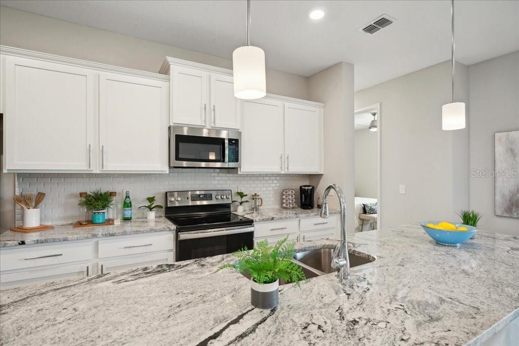 Photo of 90 Luther Drive, Palm Coast, FL 32137 (MLS # O6445274)