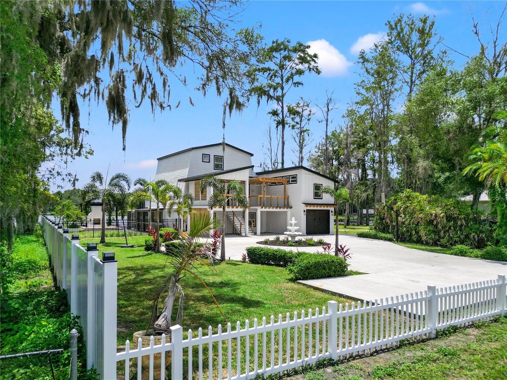 Photo of 10908 Land O Lakes Boulevard, Land O Lakes, FL 34638 (MLS # TB8552232)