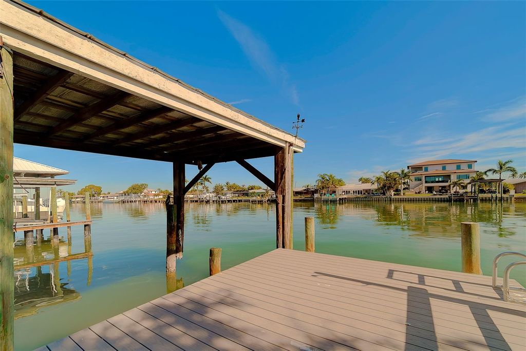 Photo of 207 Midway Island, Clearwater Beach, FL 33767 (MLS # TB8467513)