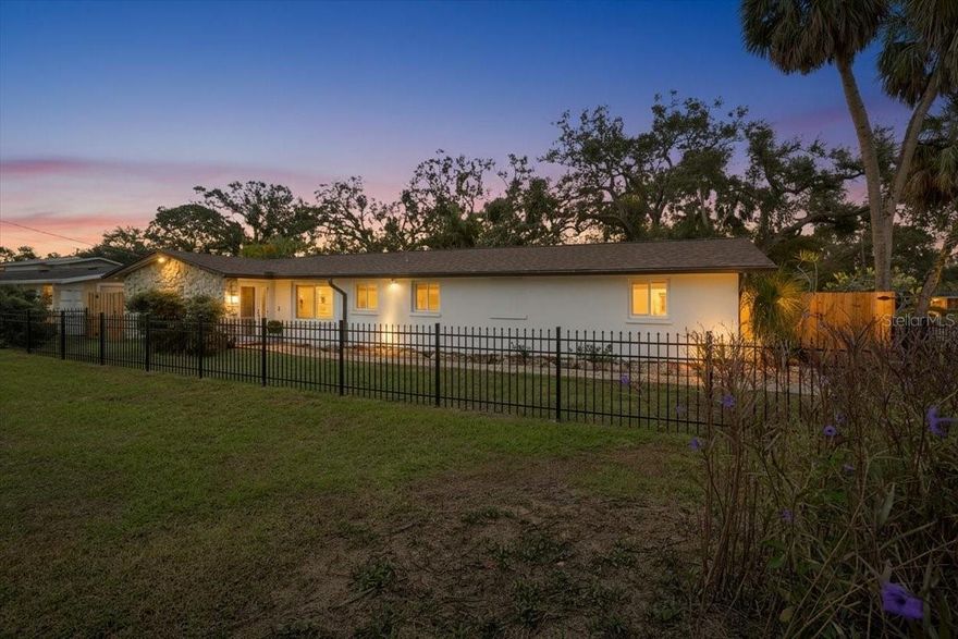 Don't miss the first unveiling of this home Saturday 1-4 before it is featured on TV. A rare find in west Bradenton, this re-imagined Tropical Highlands residence combines modern comfort, unexpected versatility, and a Florida lifestyle you simply won’t find anywhere else. Set on an oversized corner lot with no HOA and no flood zone, the property has been transformed with extensive upgrades—including impact windows and doors, a new roof, new electrical panel, relined plumbing, new bamboo flooring, new gutters and soffits, fresh fixtures, and a new mini-split AC that fully conditions the home’s standout feature: an expansive heated indoor pool wrapped in windows and designed for year-round enjoyment.

Inside, a thoughtful split floor plan offers two private primary suites, each with walk-in closets and direct access to the pool room. One primary suite includes an additional private flex room—ideal for a home office, vanity room or nursery. The second suite showcases a beautiful natural-stone accent wall.

A third bedroom—with terracotta flooring, a generous walk-in closet, and a charming window-seat nook with built-in storage—adds even more flexibility for guests or creative use.

The kitchen provides abundant cabinetry and prep space, flowing easily into bright living areas finished with plantation shutters and warm bamboo floors. Every space feels refreshingly open, clean, and move-in ready.

Outdoors, the fully fenced property includes a remote-controlled gate, mature oaks, fresh paver walkways, and an oversized tandem-depth garage that accommodates up to four vehicles or invites future workshop/hobby possibilities.

All of this is set in one of Bradenton’s most convenient pockets—walking distance to GT Bray Park and Bradenton Country Club, minutes to IMG Academy, and a short drive to the world-class beaches of Anna Maria Island.

A West Bradenton opportunity unlike anything else on the market—modernized, versatile, and ready for its next chapter.
Homes with this level of renovation and versatility rarely come to market—schedule your private showing and experience the lifestyle this property offers firsthand.