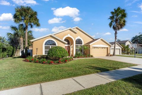 Photo of 1920 Turnberry Drive, Oviedo, FL 32765 (MLS # O6364020)