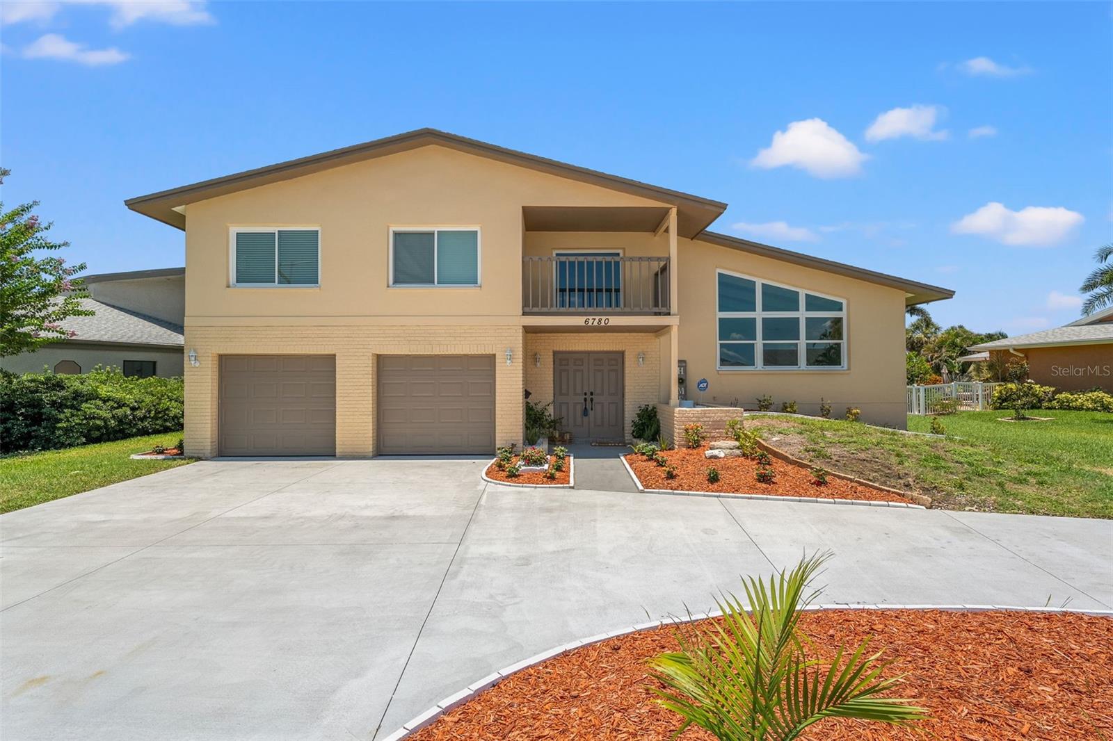 One or more photo(s) has been virtually staged. MOTIVATED SELLER, offering concessions to assist with closing costs. This gorgeous 4 bedroom, 4 bath, 2 car garage home backs right up to hole #2 of this exclusive golf course boasting members such as Tom Brady ! Located in the HIGHLY desirable area of Seminole Lakes Country Club Estates, this home's impressive layout with over 3100 sq ft. of open floor plan, tri-level, and is completely renovated. Beautifully manicured landscape, new exterior, interior paint, new doors and windows. Upon entering the grand foyer, the sky's the limit with the aesthetically pleasing vaulted ceiling beams and new LVP flooring throughout. Stay on the ground floor and you'll find a peaceful family room with serene views of the pool, a charming brick fireplace, bedroom 1, full bath, laundry closet and garage. A few steps up to the lovely kitchen, European style frameless textured cabinetry, storage galore, built-in shelving, and wine bottle holders, tie in nicely with the sleek and clean quartz countertops and double-sized island, dining room, and office equipped with a full bathroom with direct exit/entry to/from the pool. The master bedroom, closet and bath are just that, Grand! Upon entering the frosted glass double doors, it is a room fit for a king/and or queen. The master bath is a true oasis, double vanity, soaking tub, and huge walk in shower! The last two bedrooms and full guest bath are also found on the upper level of this amazing home. The outdoor aspects offer even more to gloat about, the pool enclosure is a customized ''scenic panoramic view'' to enjoy the unobstructed picturesque views of the golf course and Long Bayou, direct from the Gulf of America. So many extras to speak of, pool heater, jacuzzi, you must see this home for yourself! Mins to Park Blvd, great restaurants, schools, hospital, and entertainment. Beaches voted best in the U.S. are less than a 15-minute car ride, 20 mins to downtown St. Pete. Roof 2017, newer electric water heater, HVAC works great, just maintained. ALL OFFERS WELCOMED!!