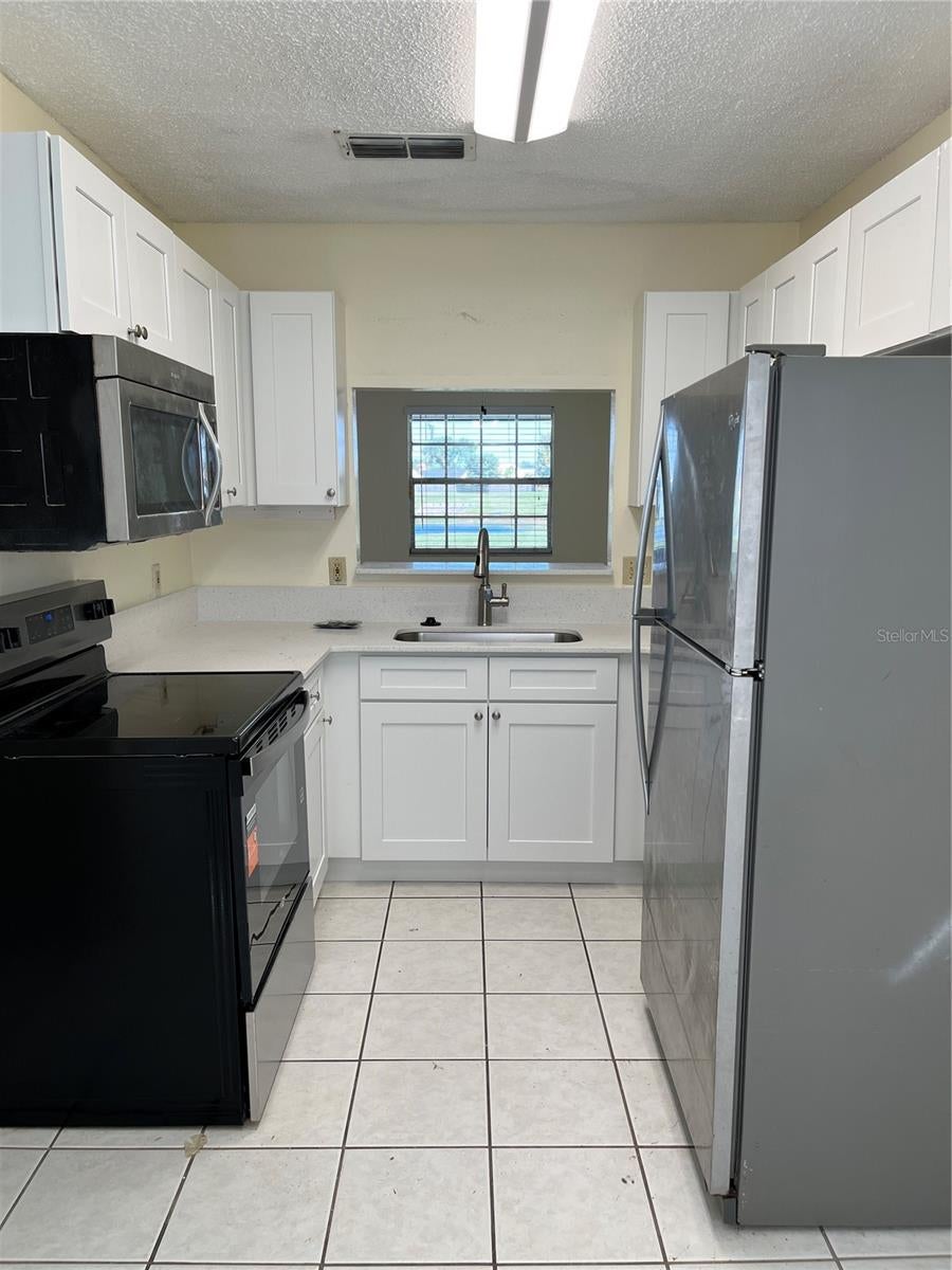 Photo of 2001 Waterleaf Street, Orlando, FL 32837 (MLS # O6452773)