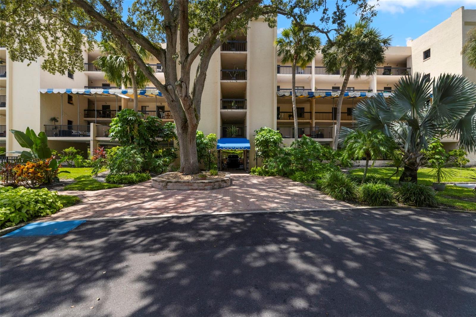 Welcome to your coastal getaway in Tarpon Springs. This beautifully updated two-bedroom, two-bathroom corner unit condo offers the perfect blend of comfort, style, and convenience. The home offers a spacious open floor plan highlighted by a charming kitchen with stainless-steel appliances and a walk-in pantry complete with an extra refrigerator. The kitchen effortlessly flows into the living and dining areas, creating the perfect setting for both everyday living and entertaining. A reading nook provides a quiet retreat with wooded views, while the private balcony overlooks the community pool, giving you both serenity and a sense of connection to the outdoors. The building provides underground assigned parking, a private storage closet, and direct walking access to a private sun deck reserved for residents. From here, you can enjoy the Florida sunshine and breathtaking access to the Gulf, perfect for canoeing, kayaking, or simply soaking in the coastal breeze. This condo is designed for both relaxation and recreation. Whether you are searching for a full-time home, a seasonal escape, or an investment property, this condo offers the ideal balance of modern updates, coastal charm, and resort-style amenities in one of Tarpon Springs’ most desirable locations.