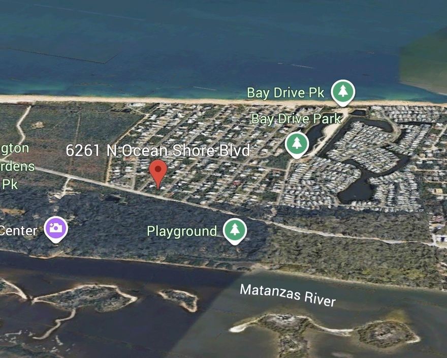 Introducing an exceptional opportunity to acquire a prime building lot zoned for both residential and commercial use, featuring an impressive 108 feet of Scenic A1A frontage in the vibrant North end of Flagler County. This sought-after location at 6261 N Ocean Shore Boulevard is oceanside along the main thoroughfare connecting the Atlantic Ocean and the Intracoastal Waterway, offering a variety of exciting development possibilities.

Significantly enhancing this opportunity is the imminent arrival of a Ritz Carlton, set to open at the end of 2026 just minutes from the property. This amazing development will undoubtedly attract more visitors and elevate the area's profile, amplifying its economic potential and desirability.

For residential opportunities, imagine creating a charming single-family home, inclusive of options for a detached garage, guest suite, or storage shed, with the added benefit of permitting vacation rentals. Investors will appreciate the expansive commercial potential; with special exception, the property could host a professional or medical office, an art gallery or studio, a retail store, and numerous other ventures. A mixed-use approach maximizes income potential—run your business on the ground floor while living or renting an upper unit in a flourishing community.

Your location offers convenient access to stunning public beaches, parks, nature trails, and a public boat ramp, with the beautiful beach just 0.4 miles away. You’ll also be close to attractions like the majestic Washington Oaks Gardens State Park, which features breathtaking gardens and unique coquina rock formations, as well as the Princess Place Preserve for kayaking and scenic exploration. Family-friendly activities nearby include the Marineland Dolphin Adventure for interactive marine experiences and the Florida Agricultural Museum showcasing the region's rich heritage.

Nestled in The Hammock, this area embodies a tranquil lifestyle characterized by lush flora and fauna, along with a strong commitment to conservation. Don't miss this hidden gem investment—where lifestyle, opportunity, and economic growth converge in one of Florida's most promising coastal communities!