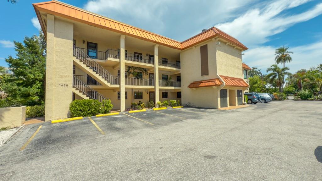 SELLER WILL CONSIDER SELLER FINANCING..........GULF ACCESS.......FIRST FLOOR..........NEW AC......SPLIT FLOOR PLAN........Welcome to 1650 Pine Tree Ln #103—where waterfront serenity meets downtown Sarasota living. From the moment you step inside, you're greeted with a sense of calm and comfort. This beautifully renovated first-floor condo features a stylish open layout with rich dark cabinetry, gleaming quartz countertops, and modern finishes that blend elegance with everyday function. The split-bedroom design offers privacy and versatility, while the upgraded bathrooms, tasteful flooring, and contemporary lighting provide a move-in-ready space that feels both fresh and timeless. The brand-new Trane A/C, installed in 2024, ensures year-round comfort no matter the season.
But what truly sets this home apart is the lifestyle it offers. Step onto your private screened lanai and soak in the tranquil views of Hudson Bayou—your backyard oasis where you can sip your morning coffee, unwind with a glass of wine, or launch a kayak for a peaceful paddle through nature. With downtown Sarasota just minutes away, you’re never far from fine dining, art galleries, Marina Jack, Selby Gardens, and the vibrant energy of city life. This is more than a home; it’s a rare opportunity to live with intention—close to everything, yet tucked away in your own quiet slice of paradise....MORE PHOTOS COMING SOON