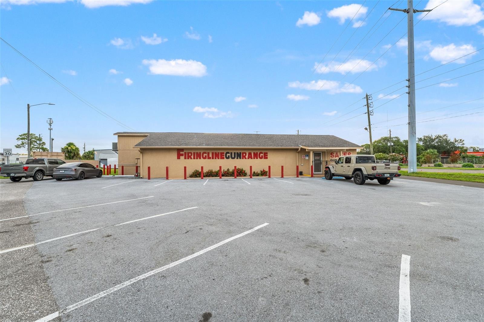Turnkey Gun Range & Retail Storefront – Established Business & Real Estate Opportunity!
Rare opportunity to own a fully operational, well-established gun range and gun shop in a high-traffic commercial corridor of Pasco County. Established in 1999, this turnkey business includes the real estate, inventory, and equipment, offering immediate income potential and long-term investment value.
The property features 7,116 SF under roof, including a spacious retail showroom, two restrooms, a small kitchen/break area, and a dedicated classroom space for training and certification courses. The heart of the facility is the nine-lane indoor shooting range, equipped with electric target returns, a Detroit bullet trap, and ballistic rubber system for added safety and sound control.
Additional highlights include a fully equipped gunsmith shop, ample storage, and a large, paved parking area. The property sits on a half-acre corner lot, with excellent visibility and access—just off US-19 and minutes to the new Ridge Road extension, offering seamless connectivity to the Suncoast Parkway (589) and a quick commute to Tampa.
Zoned for commercial use and surrounded by compatible businesses, this site offers strong drive-by exposure and is ready for a new owner to continue growing this reputable and loyal customer base.
Sale includes: Building, land, shooting range infrastructure, retail fixtures, gunsmithing equipment, and current inventory.
Don’t miss this unique opportunity to step into a thriving business with decades of community trust and a prime location.