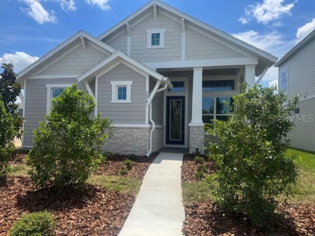 Photo of 28741 Jujube Road, Wesley Chapel, FL 33543 (MLS # O6405192)